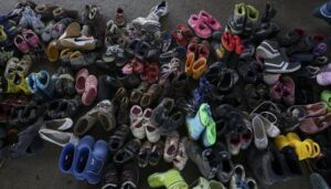 children_shoes_refugees_crisis_Budapest_September_2015_crop